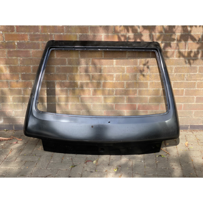 Brand New Genuine O/E Peugeot 205 Tailgate - 8701.F4