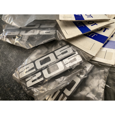Genuine OE Peugeot 205 mudflap badge kit - 9602.1G