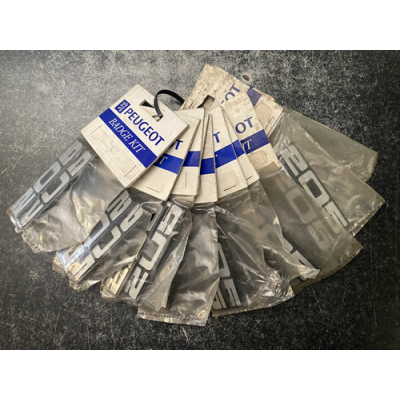 Genuine OE Peugeot 205 mudflap badge kit - 9602.1G