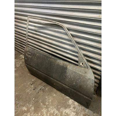 Brand New Genuine O/E Peugeot 205 3 door offside front door skin - 9010.51